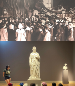 Two photos. Top photo is an old vintage photo of people in the 1900s looking at bones of a large animal in a museum. The photo below is a modern photo of a young woman standing next to a statue in front of seated children.